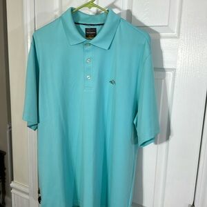 Greg Norman golf shirt. Size Large. Excellent condition.  Mint color